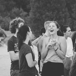 Student laughing outdoors