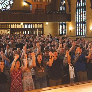 People worshipping in Dimnent Chapel