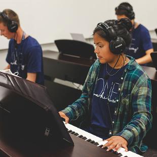 Students playing the piano