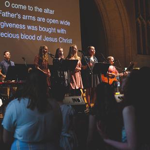 Students leading worship