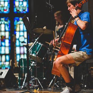 Students playing the cello and drums