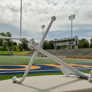 A new anchor statue has been installed as the football players enter the Ray and Sue Smith Stadium.