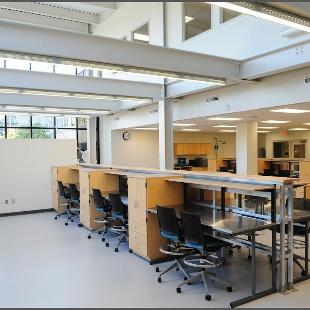 Empty desks in the Haworth Engineering Center in VanderWerf Hall